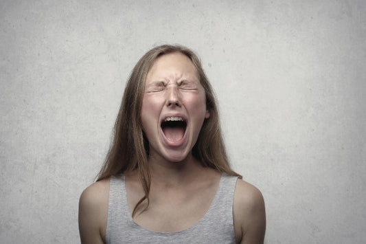 woman screaming due to dog bed smell